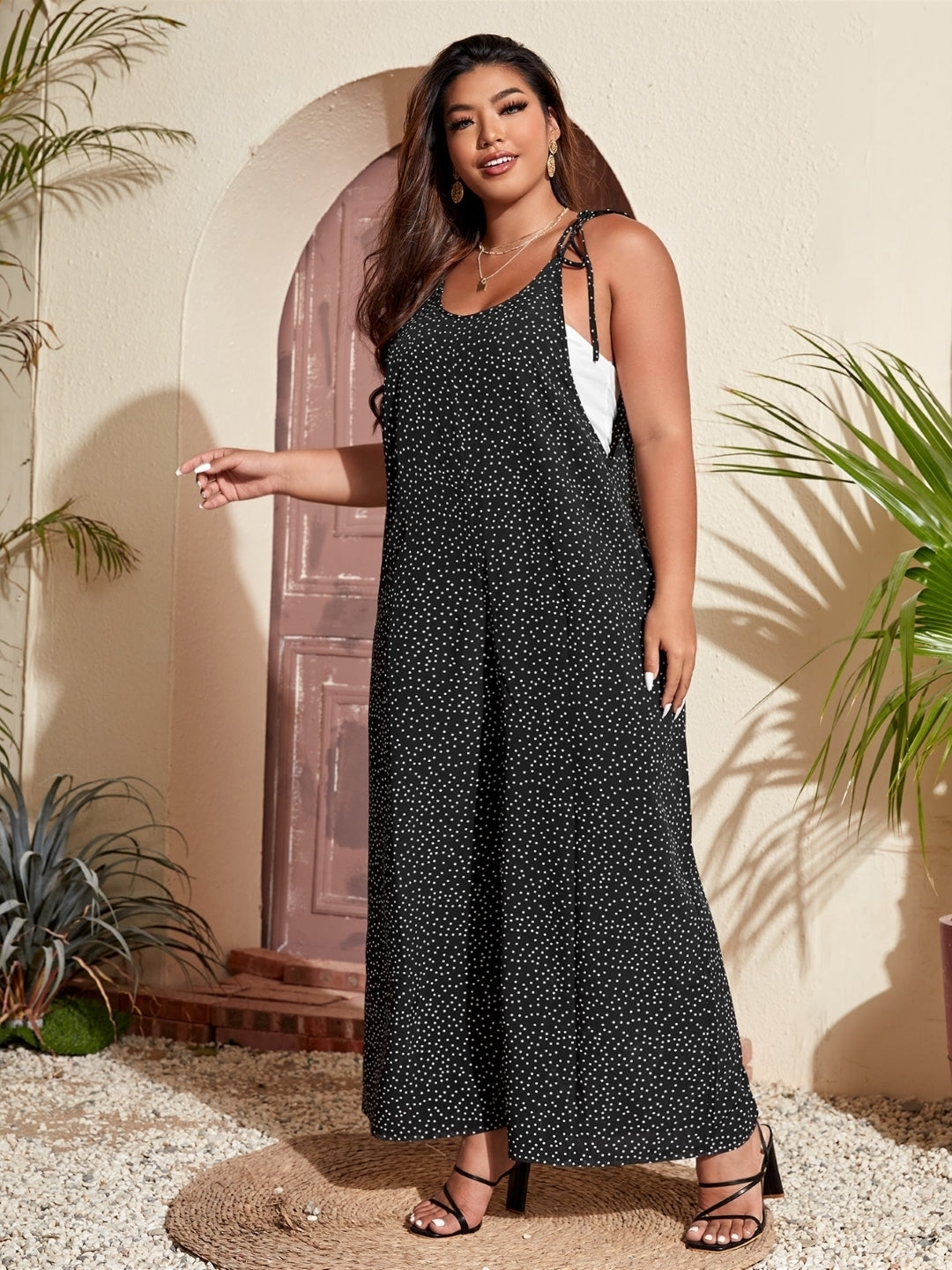 Black Round Neck Sleeveless Printed Polyester Jumpsuit