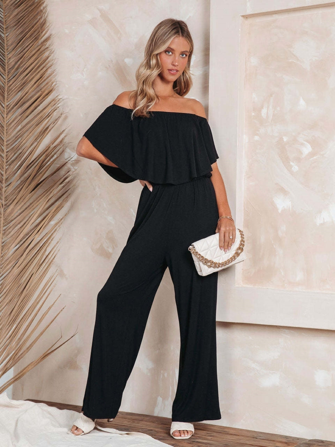 Black Off-Shoulder Short Sleeves Solid Polyester Jumpsuit